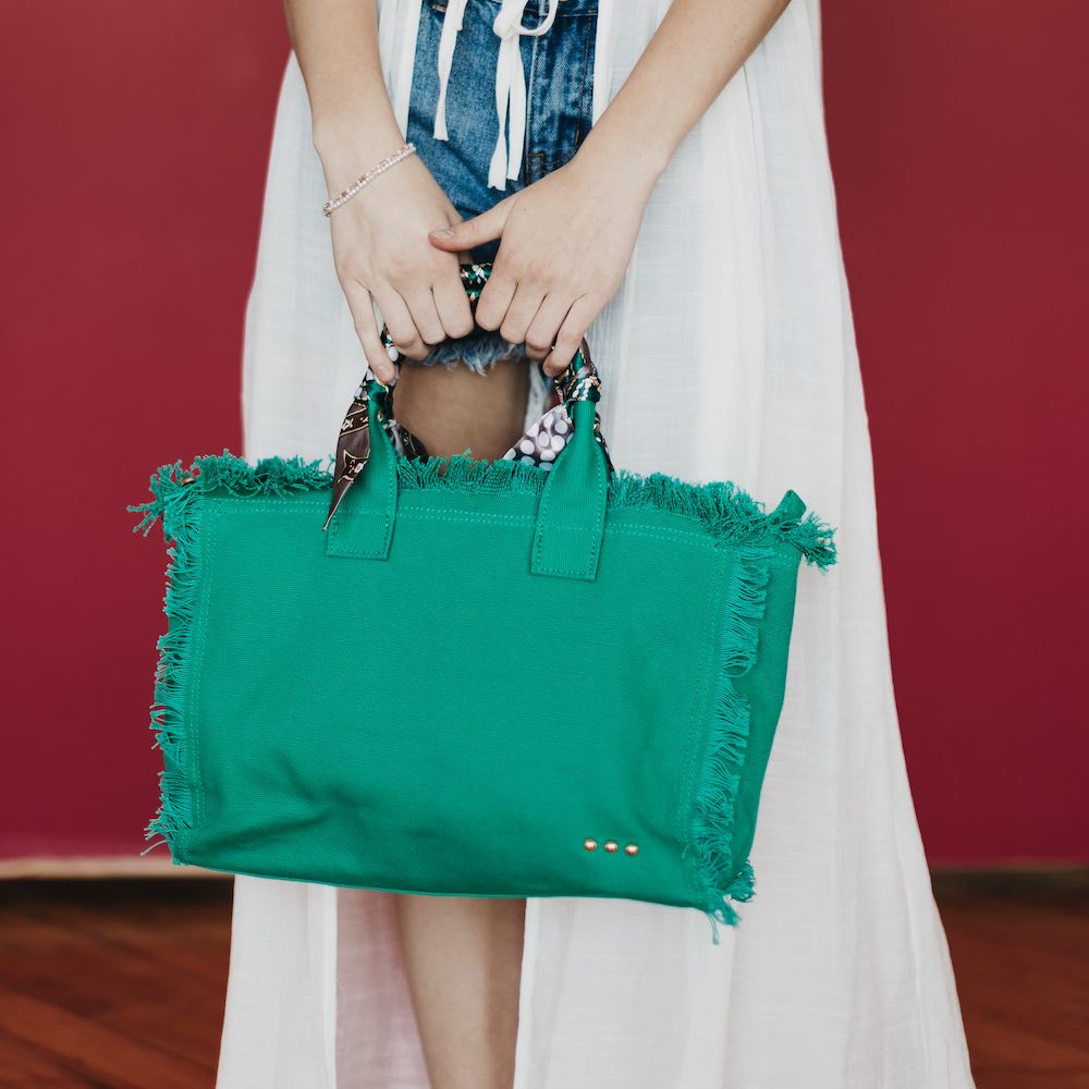 Olivia Wilde Goes All Black with a Gucci Fringe Bag - PurseBlog